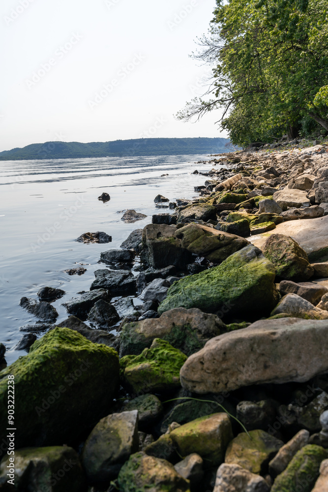 Close-up of a rocky shoreline along a lake at a local state park. Close-up of a rocky shoreline along a lake at a local state park.