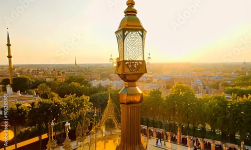 Golden Hour in Seville: An ornate lamppost glows against the panoramic cityscape, capturing the warm, ethereal beauty of Seville's Plaza de Espana at sunset. 