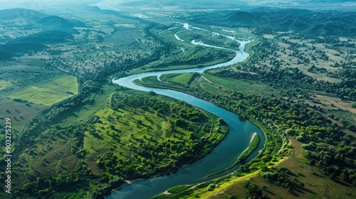 watershed A river is a geographical phenomenon in which water flows through dry land from one place to another river functions as a natural drainage system Rivers are part of the hydrological cycle photo