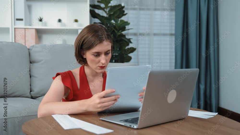 Stressed young woman has financial problems with credit card debt to pay prim from bad personal money and mortgage pay management crisis. Woman worry about financial bankruptcy risk from over spending Stressed young woman has financial problems with credit card debt to pay prim from bad personal money and mortgage pay management crisis. Woman worry about financial bankruptcy risk from over spending