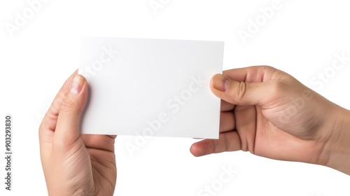 A person holding a piece of paper with handwritten notes or a letter