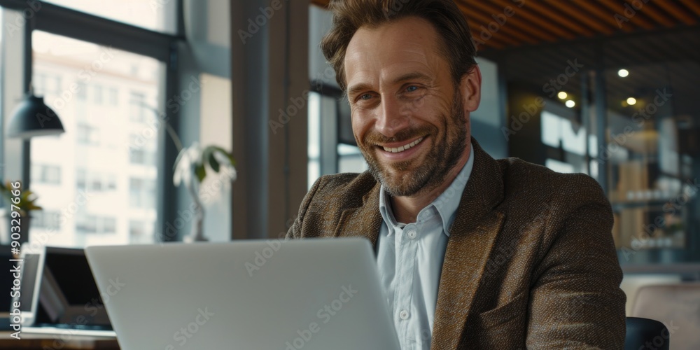 A person sitting in front of a laptop computer, possibly working or browsing A person sitting in front of a laptop computer, possibly working or browsing
