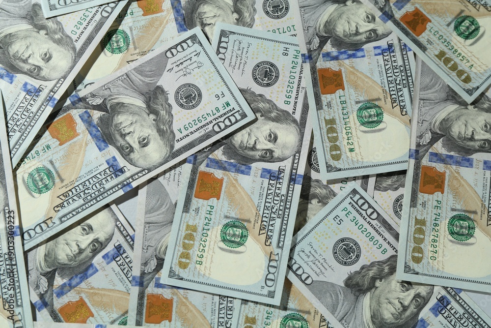 Many dollar banknotes as background, top view Many dollar banknotes as background, top view
