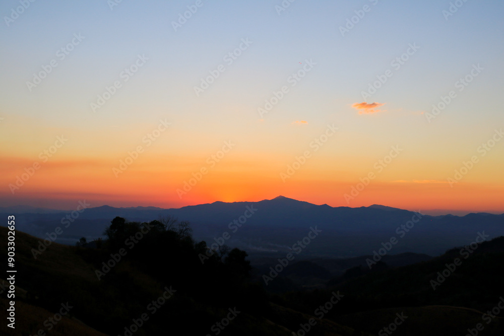 Fototapeta premium Mountain sunrise landscape orange sky in the morning Amazing nature scenery. Tourism and travel concept