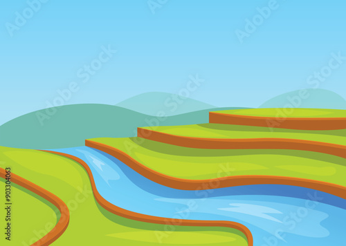 Blue river winding through green rice paddy fields on a sunny day