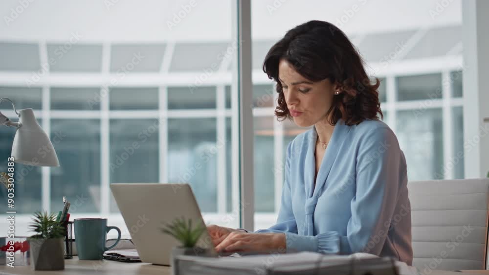 Busy businesswoman reading document at modern office feeling tired closeup. Busy businesswoman reading document at modern office feeling tired closeup.
