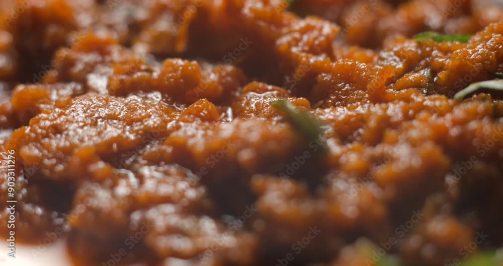 Brushetta tomato preparation rotating with basil pouring slow motion Brushetta tomato preparation rotating with basil pouring slow motion