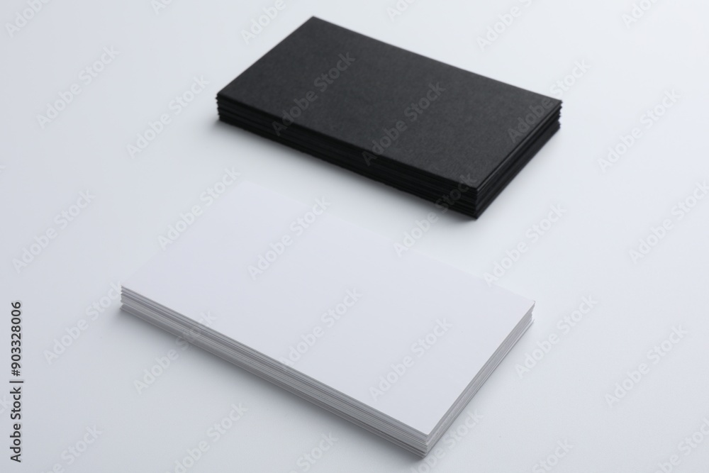Blank business cards on light grey background. Mockup for design Blank business cards on light grey background. Mockup for design