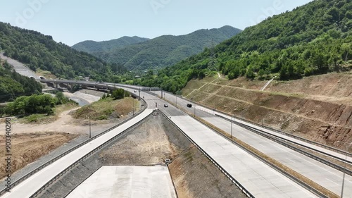 Aerial view of new road through Rikoti pass. Drone shot above highway in mountains of Georgia 2024 summer photo