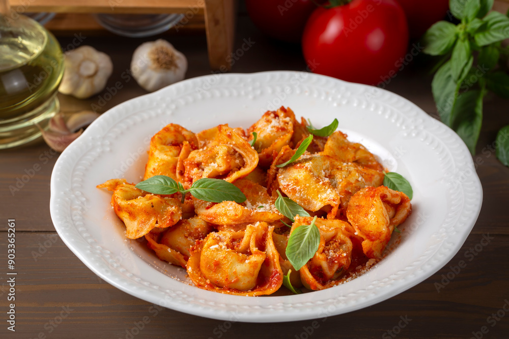 Italian tortellini pasta with tomato sauce - Italian food style Italian tortellini pasta with tomato sauce - Italian food style