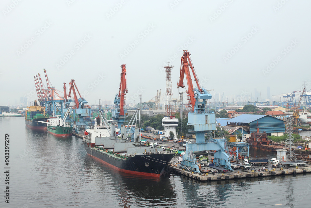 Container Ship Docked In The Port For Loading And Unloading Containers Container Ship Docked In The Port For Loading And Unloading Containers