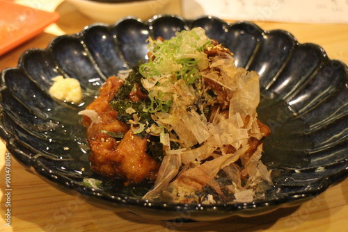 Japanese cuisine : Chicken karaage (Deep fried chicken) with dashi sauce in Kyoto, Japan photo