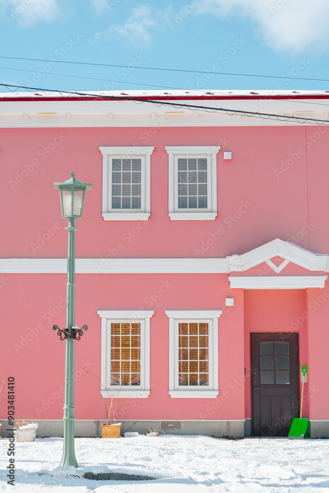 Pink house and winter snow in Hakodate, Hokkaido, Japan