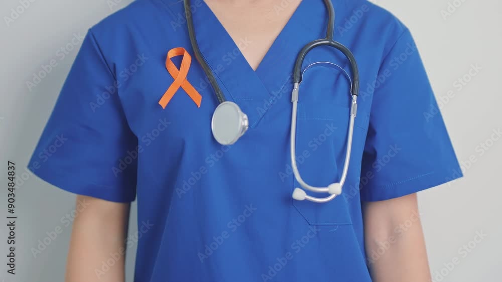 Orange Ribbon for Leukemia, Kidney cancer day, world Multiple Sclerosis, CRPS, Self Injury Awareness month. Healthcare and word cancer day concept Orange Ribbon for Leukemia, Kidney cancer day, world Multiple Sclerosis, CRPS, Self Injury Awareness month. Healthcare and word cancer day concept