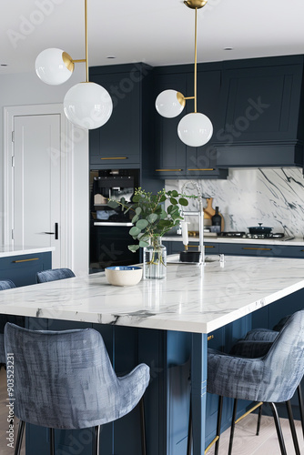 Clean marble dining table in a Scandinavian kitchen. Modern monochrome interior with blue drawers photo