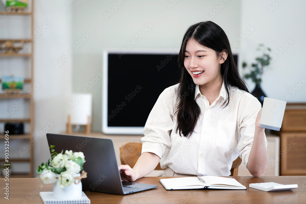 Young pretty woman working from home. Drinking coffee. Young pretty woman working from home. Drinking coffee.