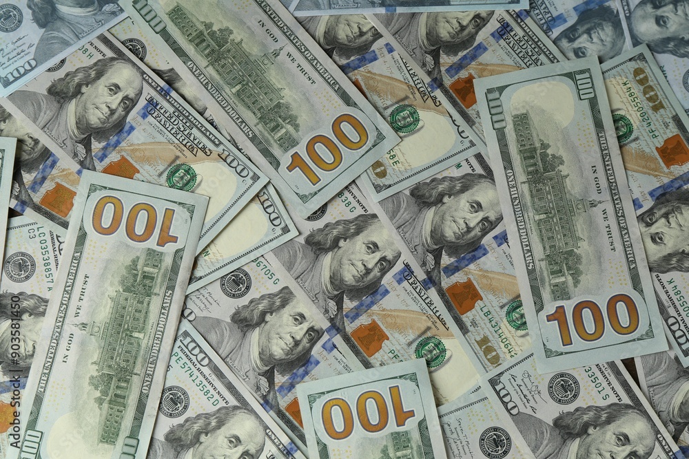 Many dollar banknotes as background, top view Many dollar banknotes as background, top view