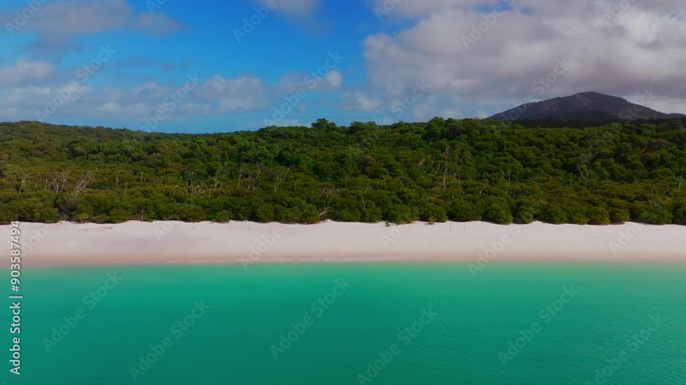 Whitehaven Beach white sand beach front aerial drone Whitsundays Island Australia heavenly sunny sun clouds blue sky outer Great Barrier Reef clear blue aqua ocean bush Airlie national park static Whitehaven Beach white sand beach front aerial drone Whitsundays Island Australia heavenly sunny sun clouds blue sky outer Great Barrier Reef clear blue aqua ocean bush Airlie national park static