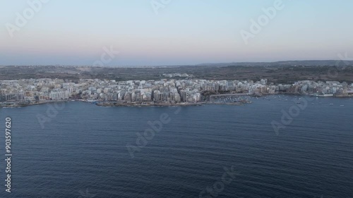 Aerial View Of The Waterfront Cityscape Of St Paul`s Bay Marina In Bugibba, Malta Island. photo