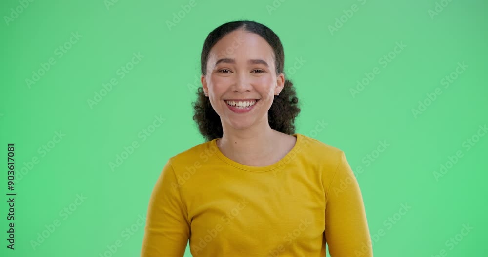 Woman, wink and happy on green screen in portrait, secret and clue in studio. Promotion, gesture and female person on chroma key for optimism, comic joke and silly face for humor and playfulness Woman, wink and happy on green screen in portrait, secret and clue in studio. Promotion, gesture and female person on chroma key for optimism, comic joke and silly face for humor and playfulness