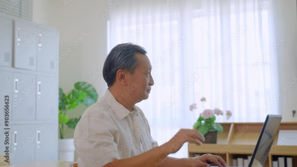 Asian mature male student study with instructor in classroom at school. Asian mature male student study with instructor in classroom at school.