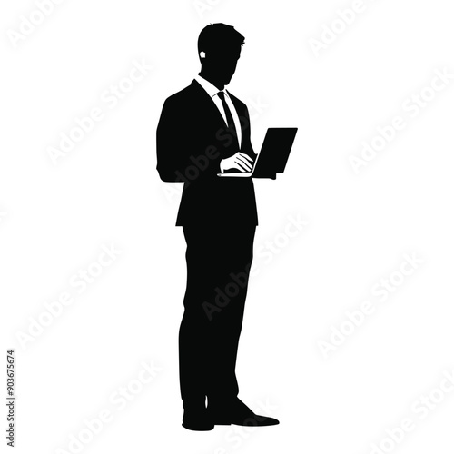 Silhouette of a businessman using a laptop. Business concept.