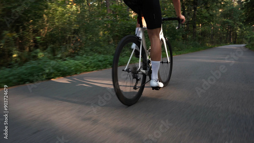 Cyclist riding on a forest road