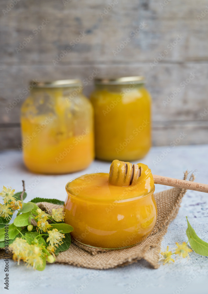 Linden Honey on wooden background Linden Honey on wooden background