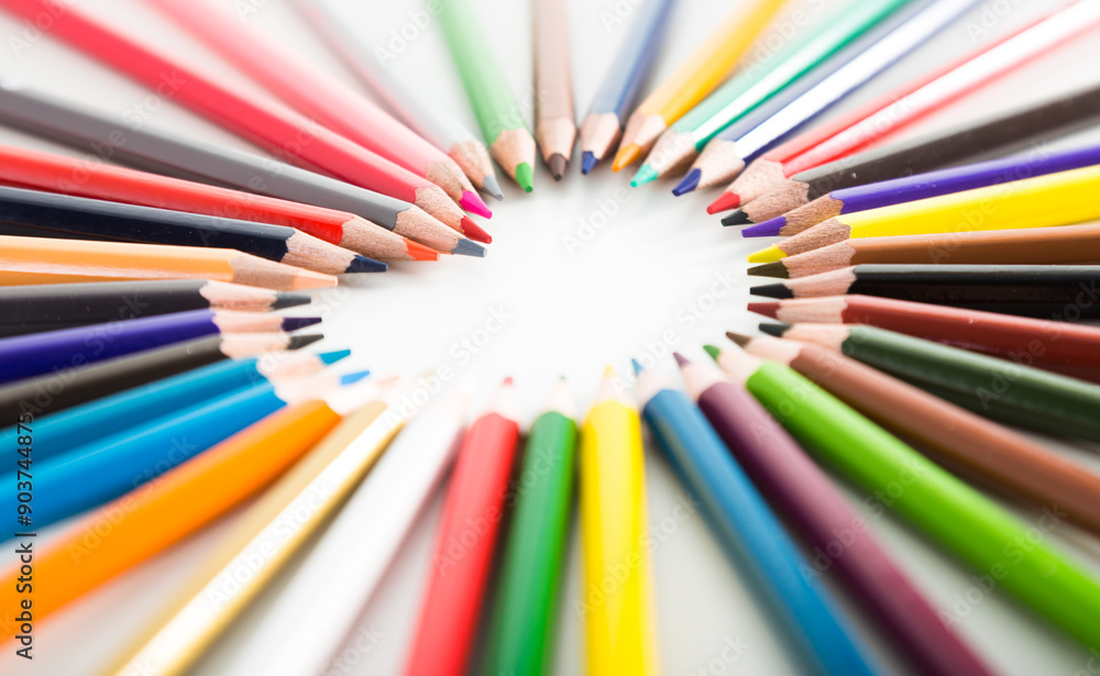 colored pencils lying around the heart colored pencils lying around the heart