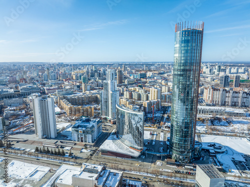 Yekaterinburg aerial panoramic view in Winter at sunset. Yekaterinburg city and pond in winter.