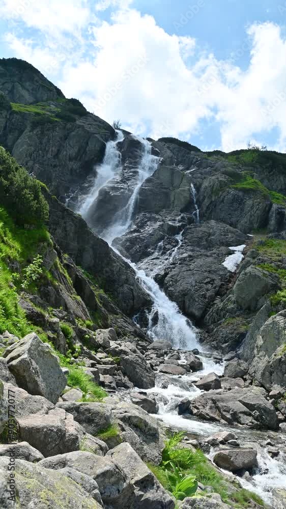 Waterfall in the mountains in summer. Siklawa Falls. Waterfall in the mountains in summer. Siklawa Falls.