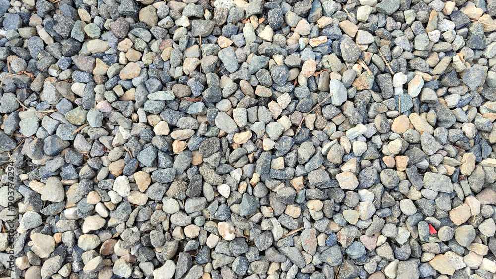 Ground stone grey background of many small stones. Selective focus Ground stone grey background of many small stones. Selective focus
