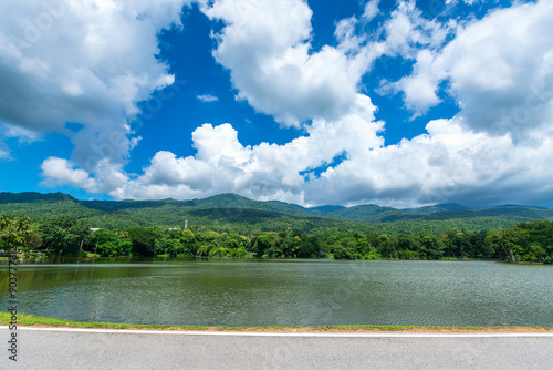 a public place leisure travel landscape lake views at Ang Kaew Chiang Mai University and Doi Suthep nature forest Mountain views spring cloudy sky background with white cloud. photo