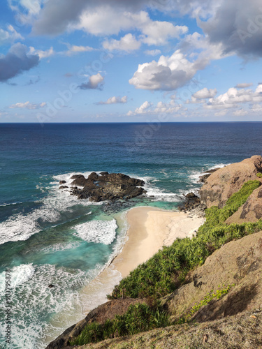 Merese Hill in Lombok is a hill famous for its beauty for a long time, and is even popular among visitors from abroad, beach and hill, view of the sea from the Hill, danger cliff edge, dog on the hill photo