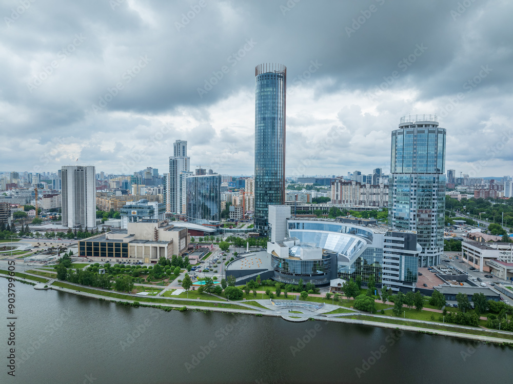 Obraz premium Yekaterinburg city with Buildings of Regional Government and Parliament, Dramatic Theatre, Iset Tower, Yeltsin Center, panoramic view at summer sunset.