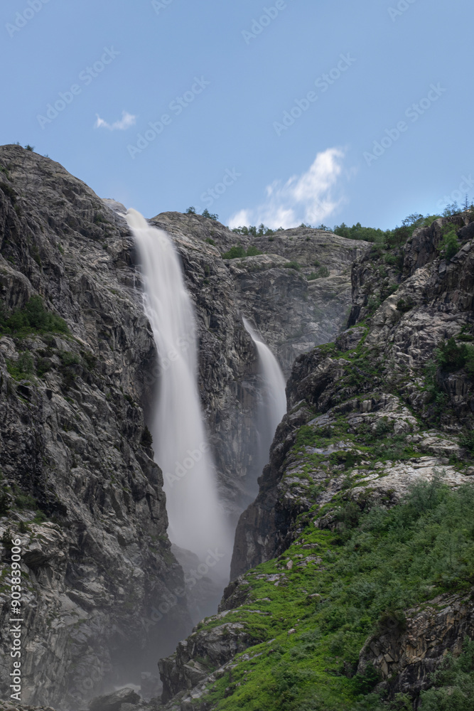 Obraz premium Shdugra waterfall with neighbour waterfalls near Village Mazeri, Svaneti. Expedition in Forest nearby Ushba Mountain.Shdugra waterfall near Mazeri, Georgia. 