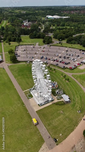 Aerial crane shot of ferris wheel at Willen Lake, Milton Keynes