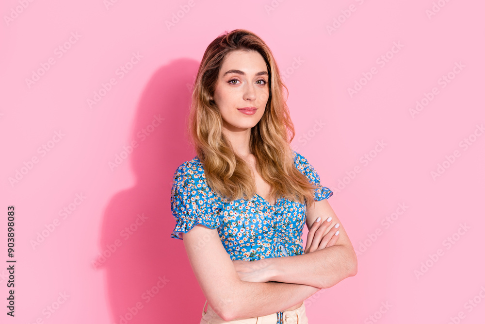 Photo portrait of pretty young girl crossed hands confident wear trendy blue flower print outfit isolated on pink color background Photo portrait of pretty young girl crossed hands confident wear trendy blue flower print outfit isolated on pink color background