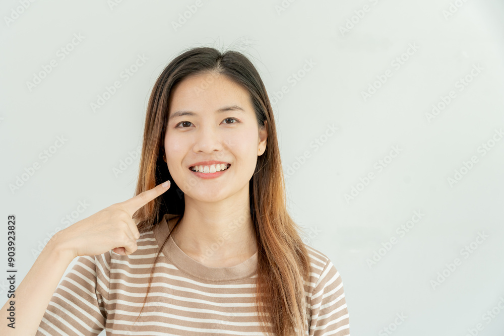 Dental Care. Healthy Smile senior beautiful asia woman show beautiful of teeth, confident in orthodontics, advertising, white teeth, online plating, dentures, dental implants Dental Care. Healthy Smile senior beautiful asia woman show beautiful of teeth, confident in orthodontics, advertising, white teeth, online plating, dentures, dental implants