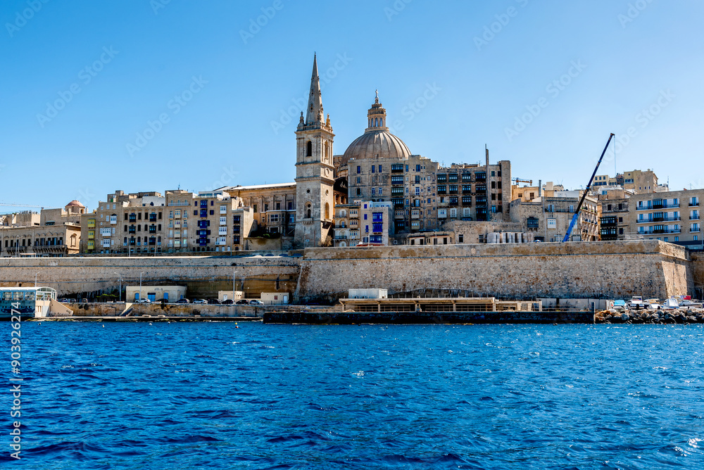 Fototapeta premium Beautiful cityscape with ancient architecture of the Valletta city in Malta. View from the sea