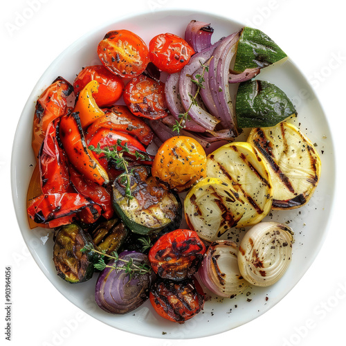 A plate of colorful grilled vegetables, including zucchini, peppers, onions, and tomatoes. photo