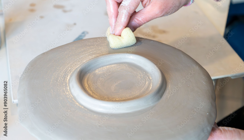 Fototapeta premium shape clay with hands 