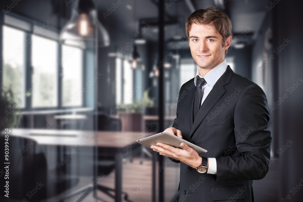 Portrait of confident business man with digital tablet. Portrait of confident business man with digital tablet.