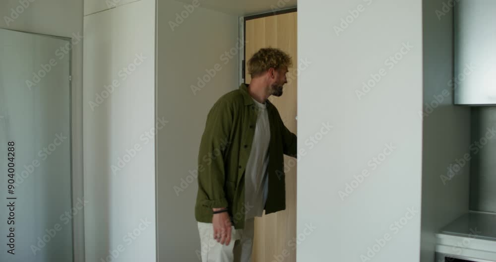custom made wallpaper toronto digitalA man in casual clothes opens the front door and takes the box from the delivery guy. Daylight