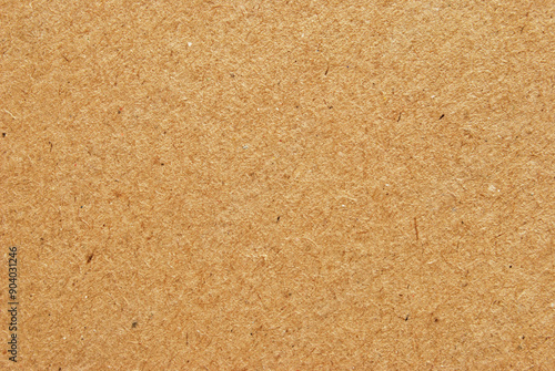 A sheet of brown recycled cardboard texture as background