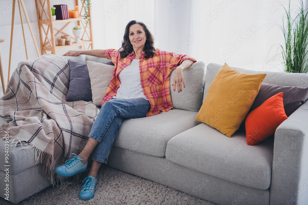 Photo of adorable sweet lady wear plaid shirt smiling relaxing comfortable sofa indoors room home house Photo of adorable sweet lady wear plaid shirt smiling relaxing comfortable sofa indoors room home house