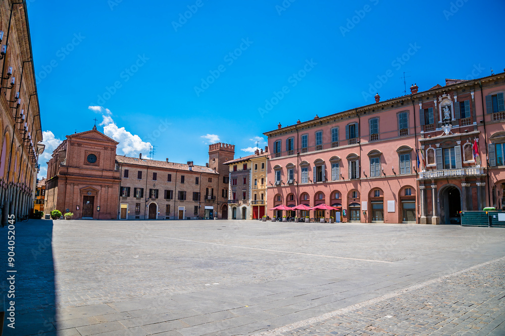 Obraz premium A view from the corner across the Matteotti Square in Imola, Italy in summertime