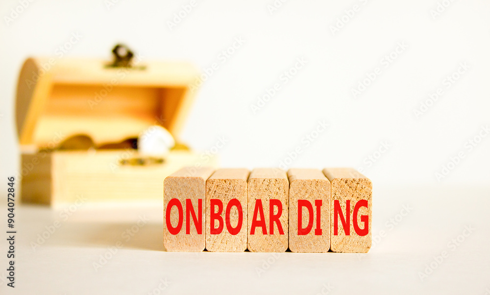 Onboarding success symbol. Concept word Onboarding on wooden blocks. Beautiful white background. Beautiful wooden chest with coins. Business onboarding success concept. Copy space. Onboarding success symbol. Concept word Onboarding on wooden blocks. Beautiful white background. Beautiful wooden chest with coins. Business onboarding success concept. Copy space.
