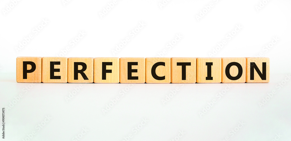 Perfection symbol. Concept word Perfection on beautiful wooden blocks. Beautiful white background. Business perfection concept. Copy space. Perfection symbol. Concept word Perfection on beautiful wooden blocks. Beautiful white background. Business perfection concept. Copy space.