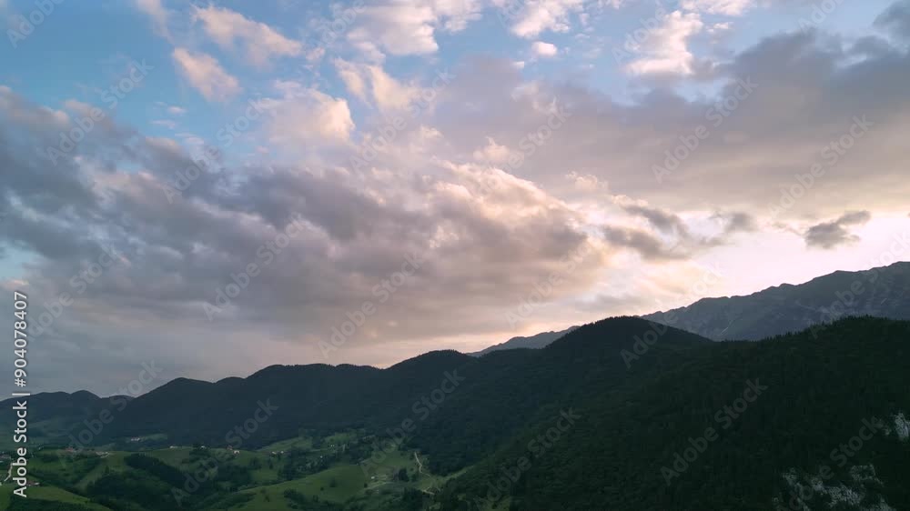 Aerial drone shot of Valea Prapastiilor as seen from the sky of Magura on a green sunny summer day. The romanian Carpathian mountains Piatra Craiului area seen from above. Top down footage of canyon.
Aerial drone shot of Valea Prapastiilor as seen from the sky of Magura on a green sunny summer day. The romanian Carpathian mountains Piatra Craiului area seen from above. Top down footage of canyon.